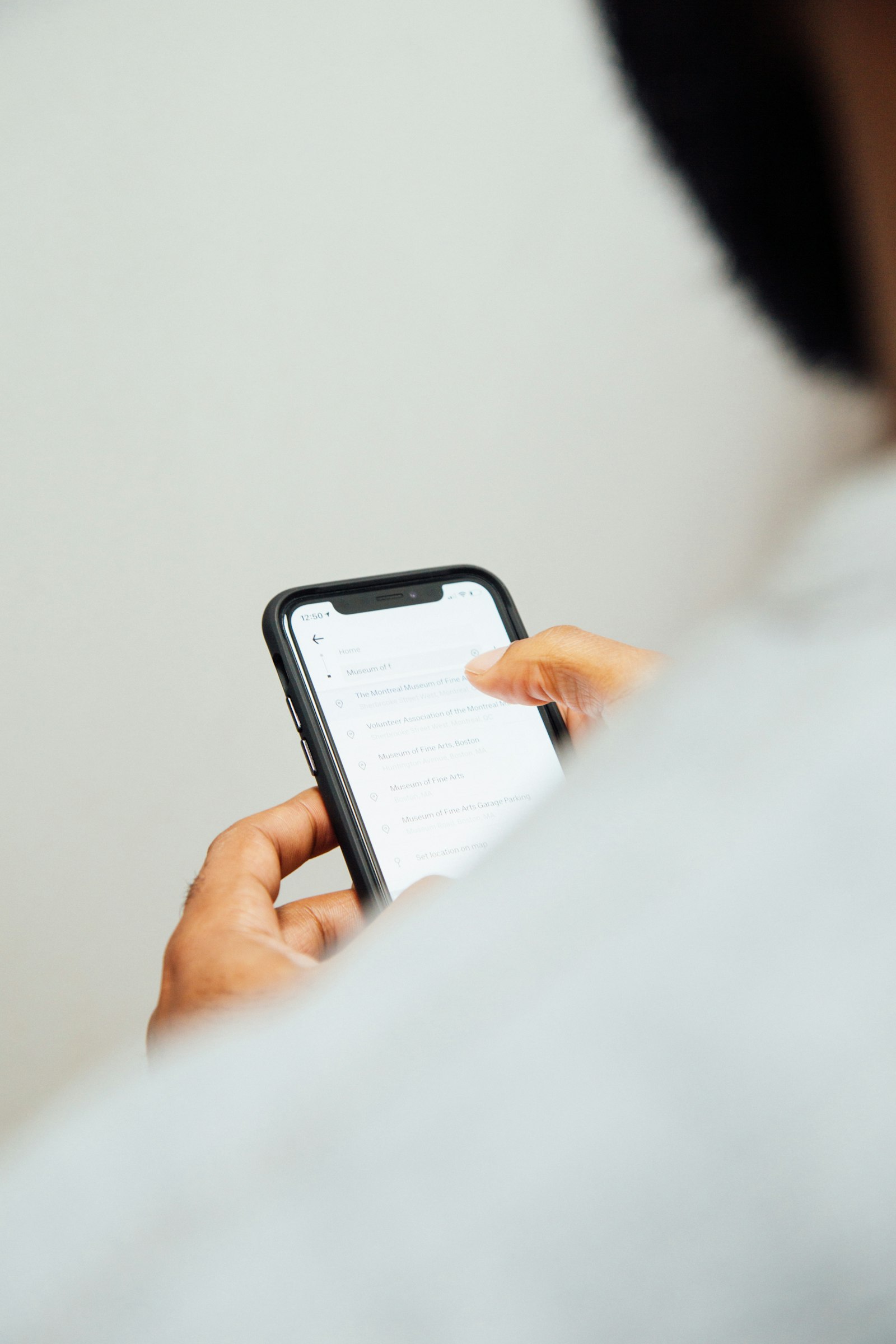 A person reading a text message on their phone