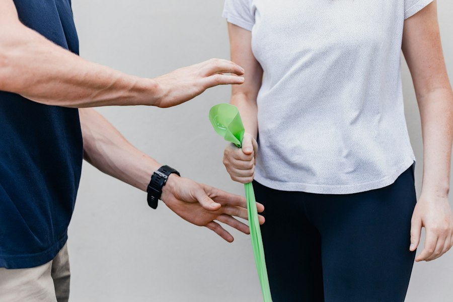 A physical therapist working with a patient
